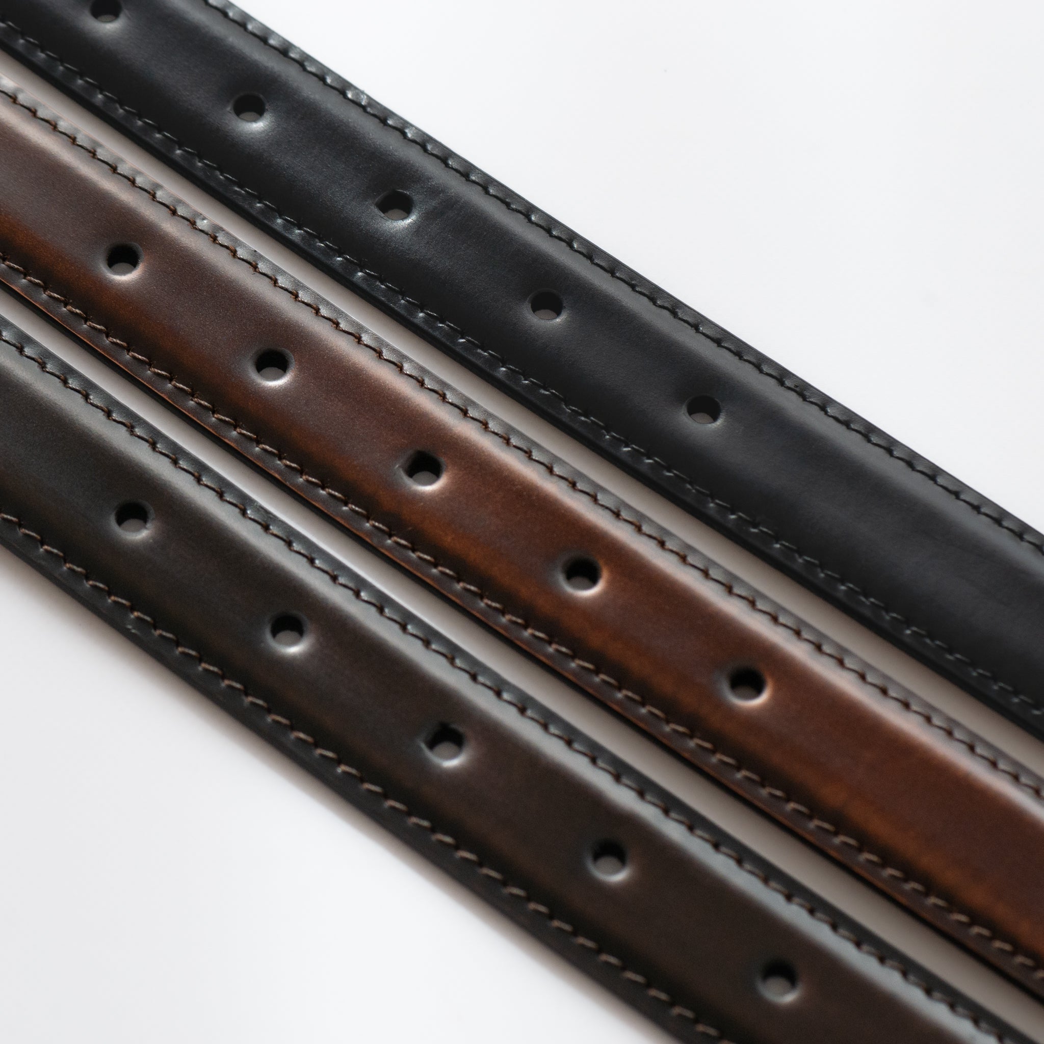 OVAL TWIST BUCKLE CORRECTED GRAIN LEATHER BELT